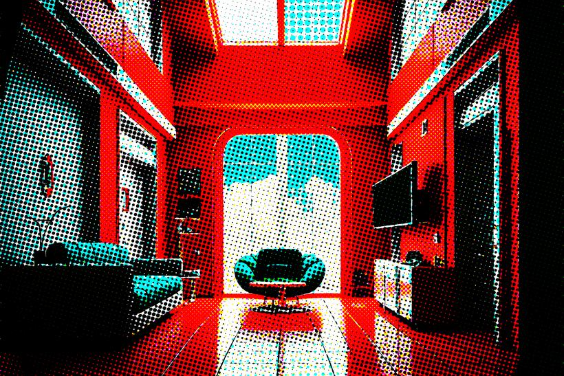 A saturated red halftone lounge with modernist chairs and a bright doorway.